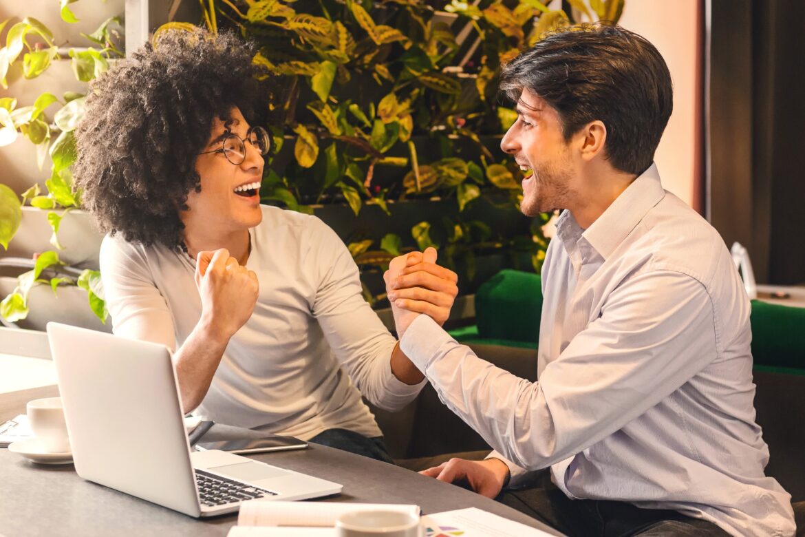 excited partners celebrating success on finding right job that match his skill